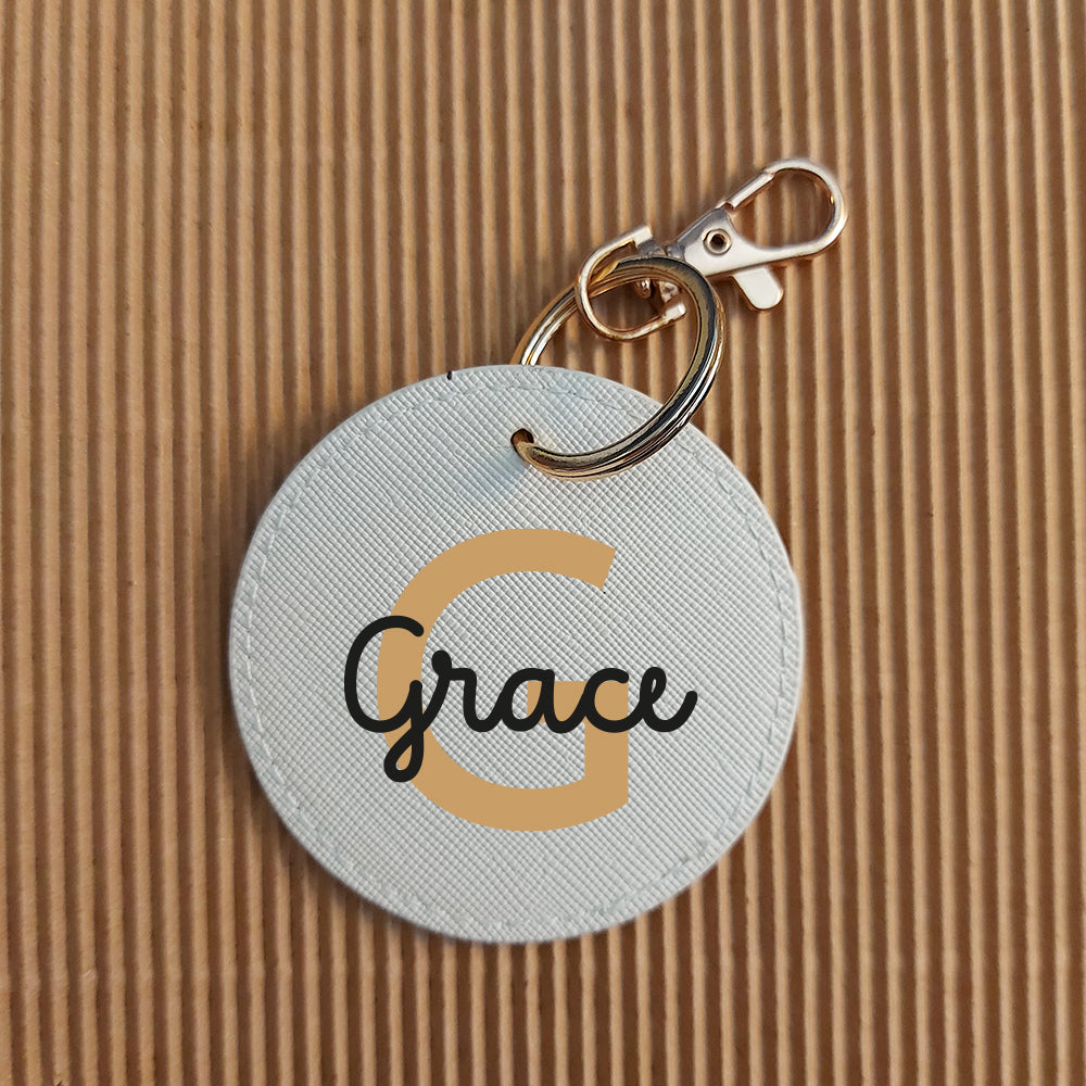 portachiavi tondo in similpelle personalizzato con nome