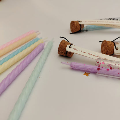 Primo piano dei colori candeline pastello disponibili per Ampollina dei Desideri con tonalità rosa, crema, azzurro, lilla e verde acqua